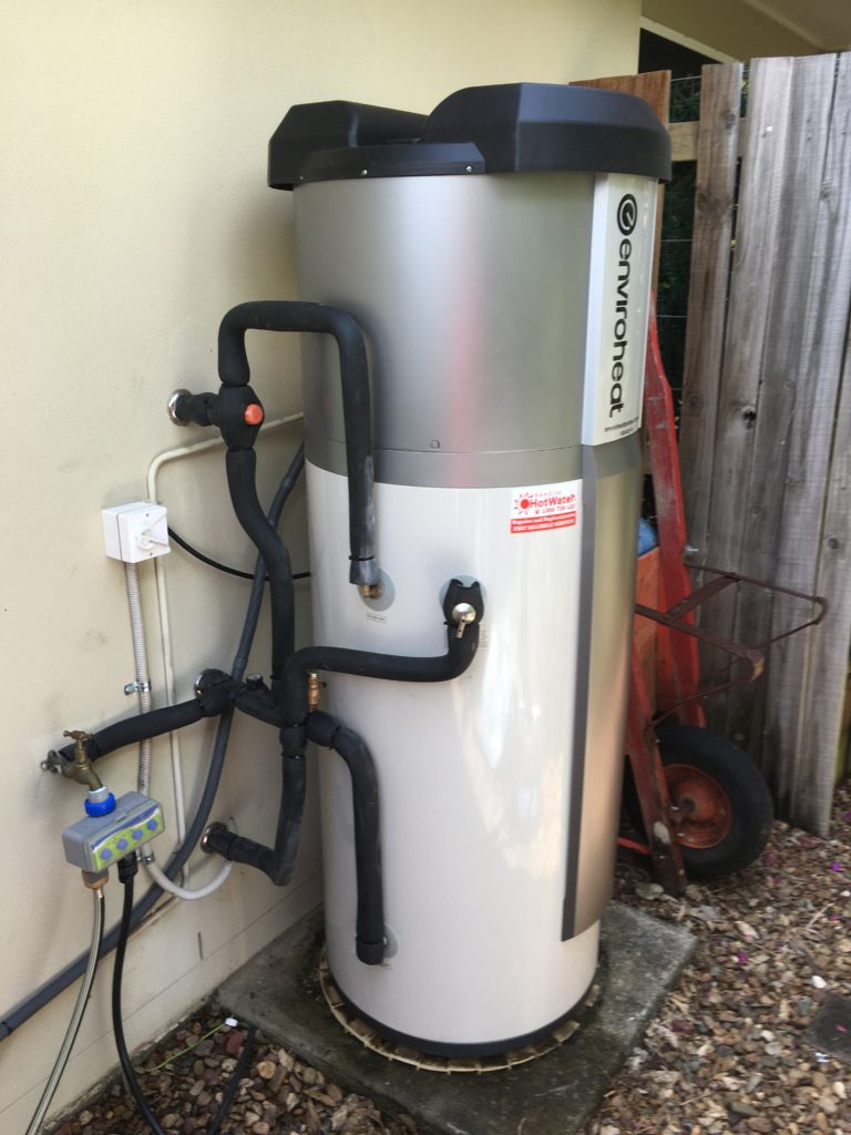 Outdoor heat pump hot water system fitted at a home in Noosa by local hot water specialists
